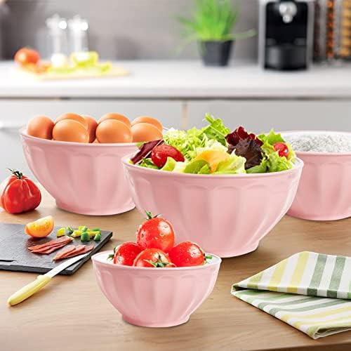 Pink plastic nesting bowls with egg whisk — photo 3